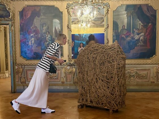 Woman looking at art