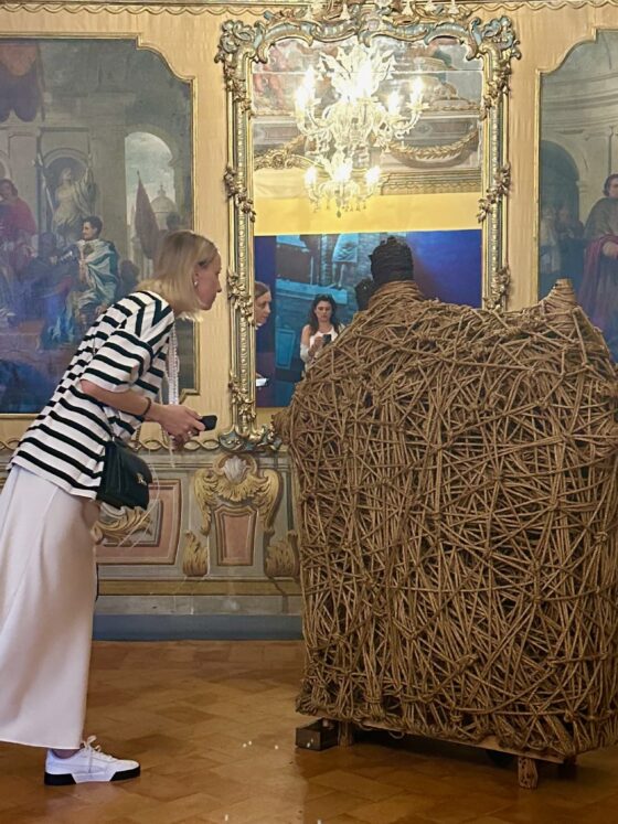 Woman looking at art